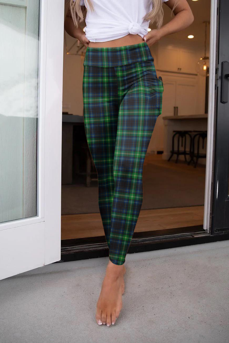 Luxurious emerald green Leggings with deep, rich tones.